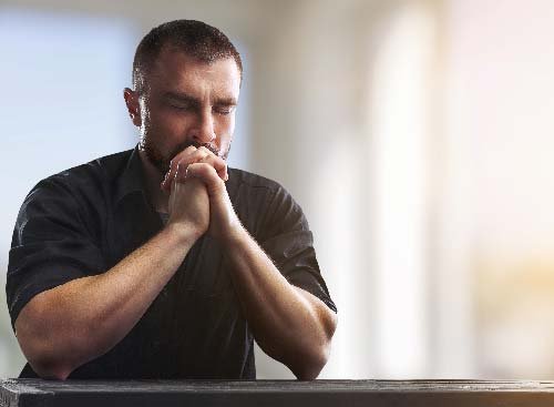 man praying